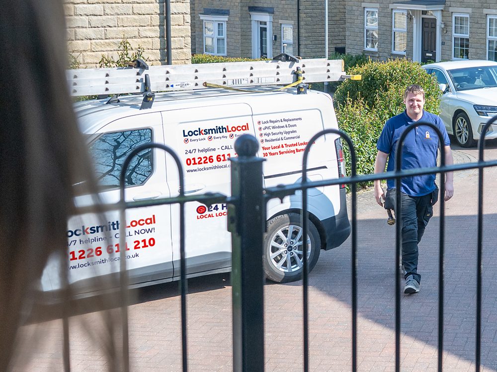 A LocksmithLocal locksmith arriving to help