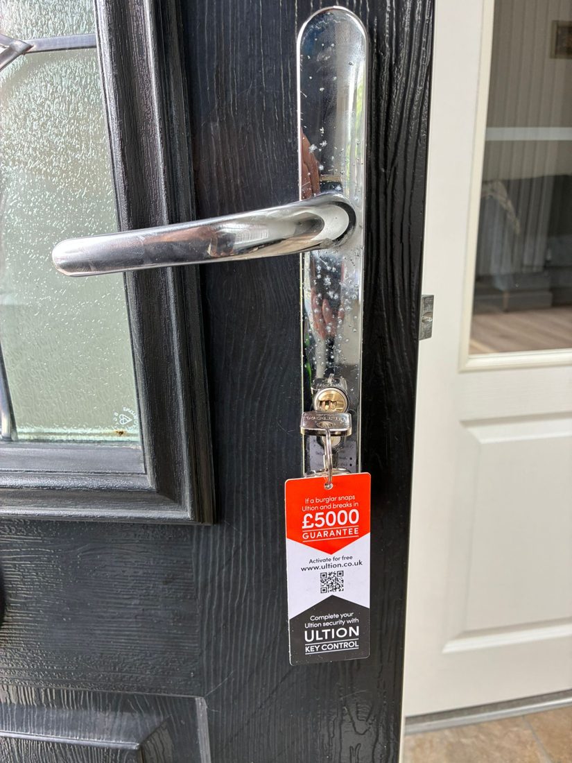 Faulty cylinder replaced with upgrade on composite door — Lock Upgrade in Halifax by LocksmithLocal