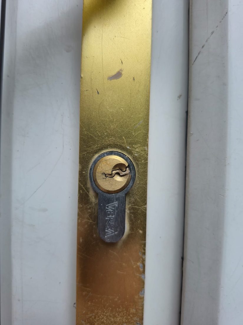 A snapped key lodged in a euro cylinder, being extracted from the lock