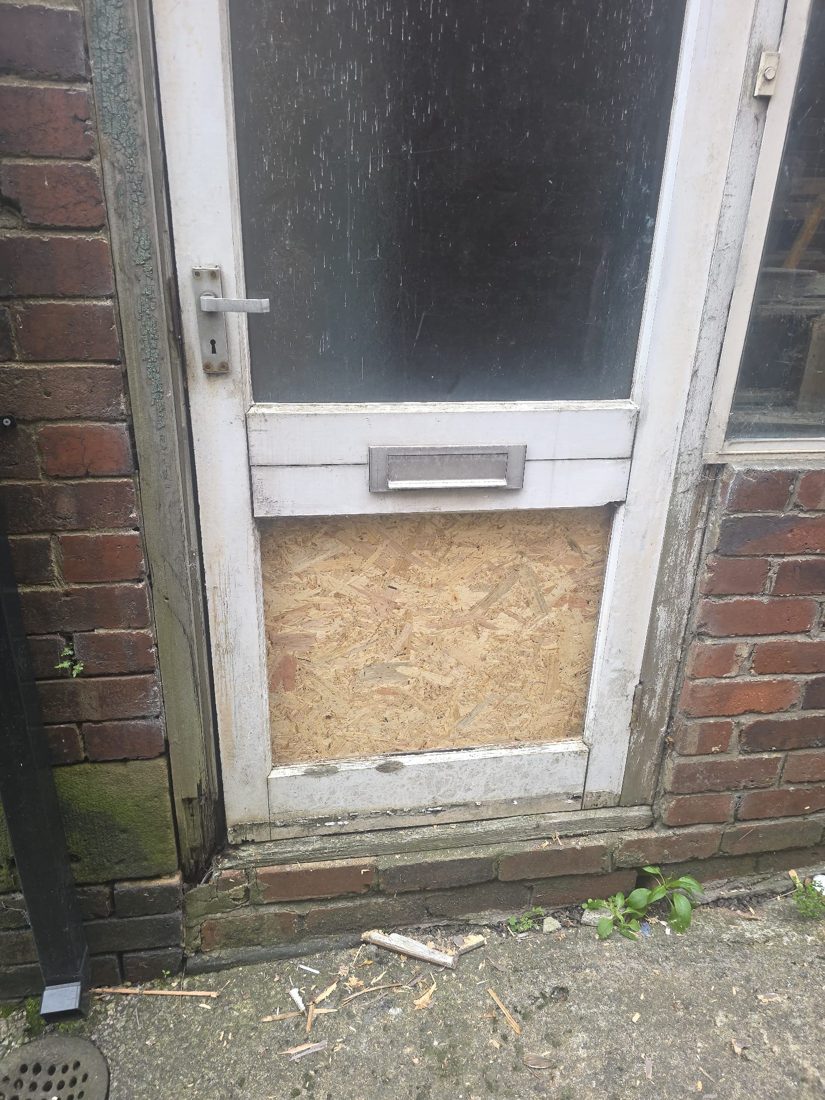 Door boarded up — Burglary Repair in Halifax by LocksmithLocal