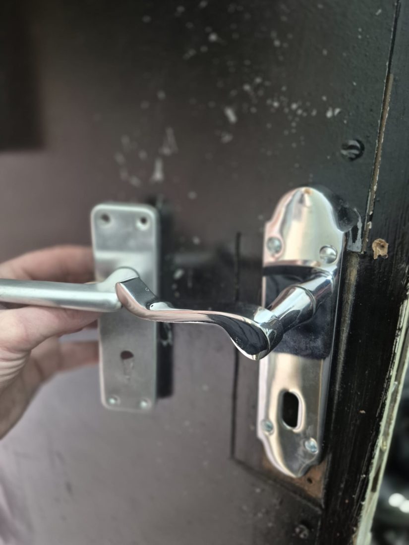 Replacement handles fitted on wooden door — Lock Change by LocksmithLocal