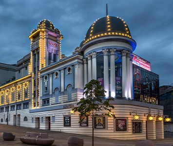 The Grade II listed Alhambra Theatre, an Edwardian landmark in Bradford city centre known for its domed turret and Corinthian columns