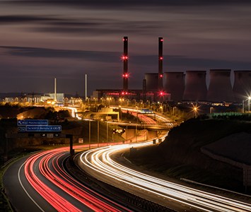 Traffic trails on the road near Castleford, with the cooling towers of the former Ferrybridge power station — demolished in 2022 — once a landmark on the skyline