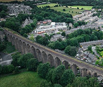 The great stone railway viaduct striding across the valley at Denby Dale, the landmark that dominates the village